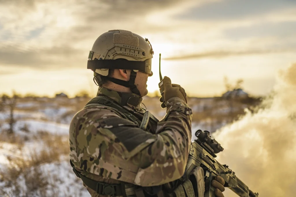 Tactical shirt on soldier talking on radio