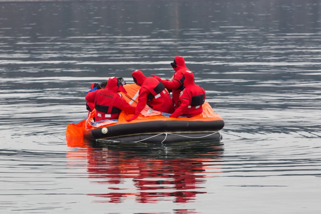 life rafts with passengers on board