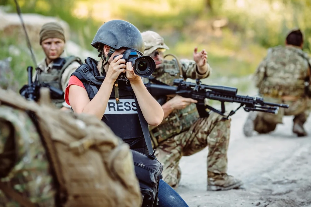 Journalist wearing a bulletproof vest for press