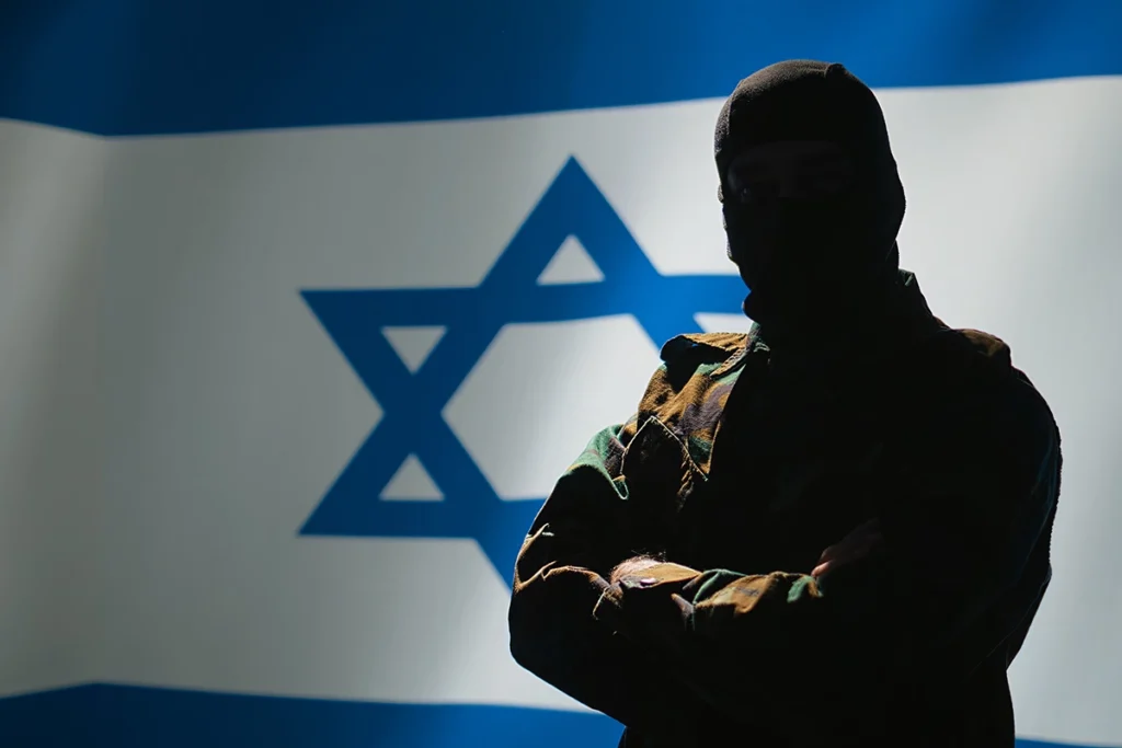 The "Made in Israel - highest quality equipment" logo, featuring the Israeli flag and a 100% quality stamp, symbolizing reliable tactical gear