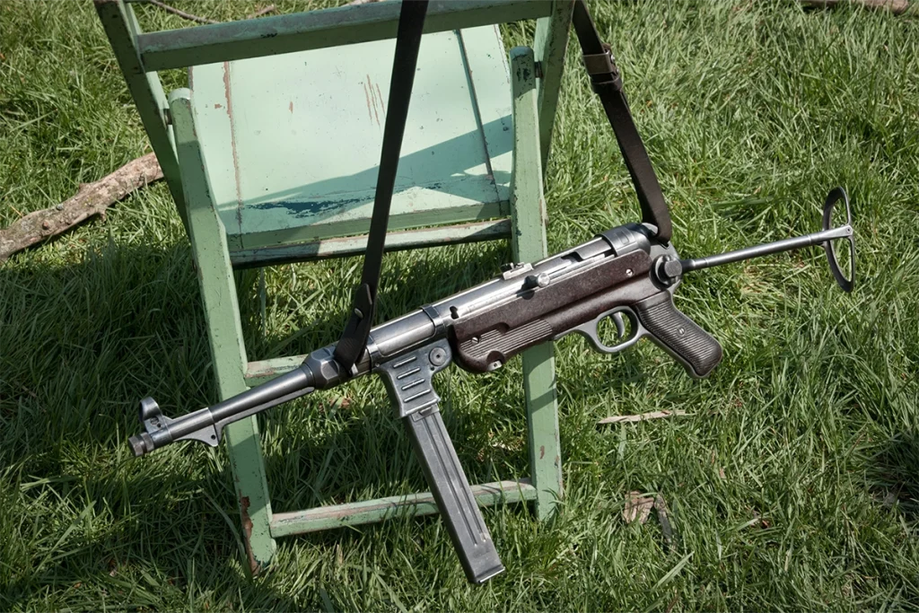 Black rifle sling with a widened shoulder section